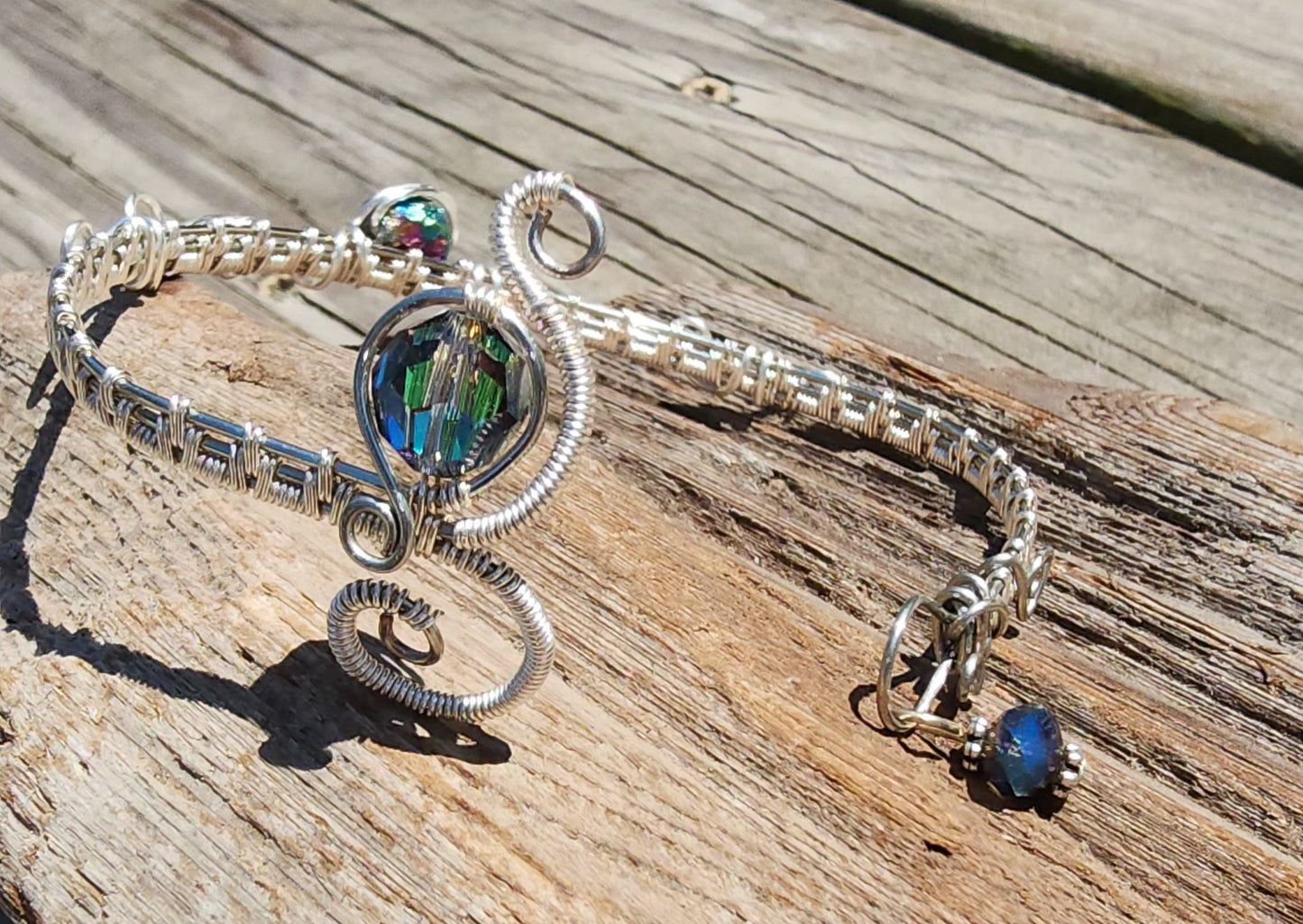 Silver wire wrapped bracelet with brilliant crystals