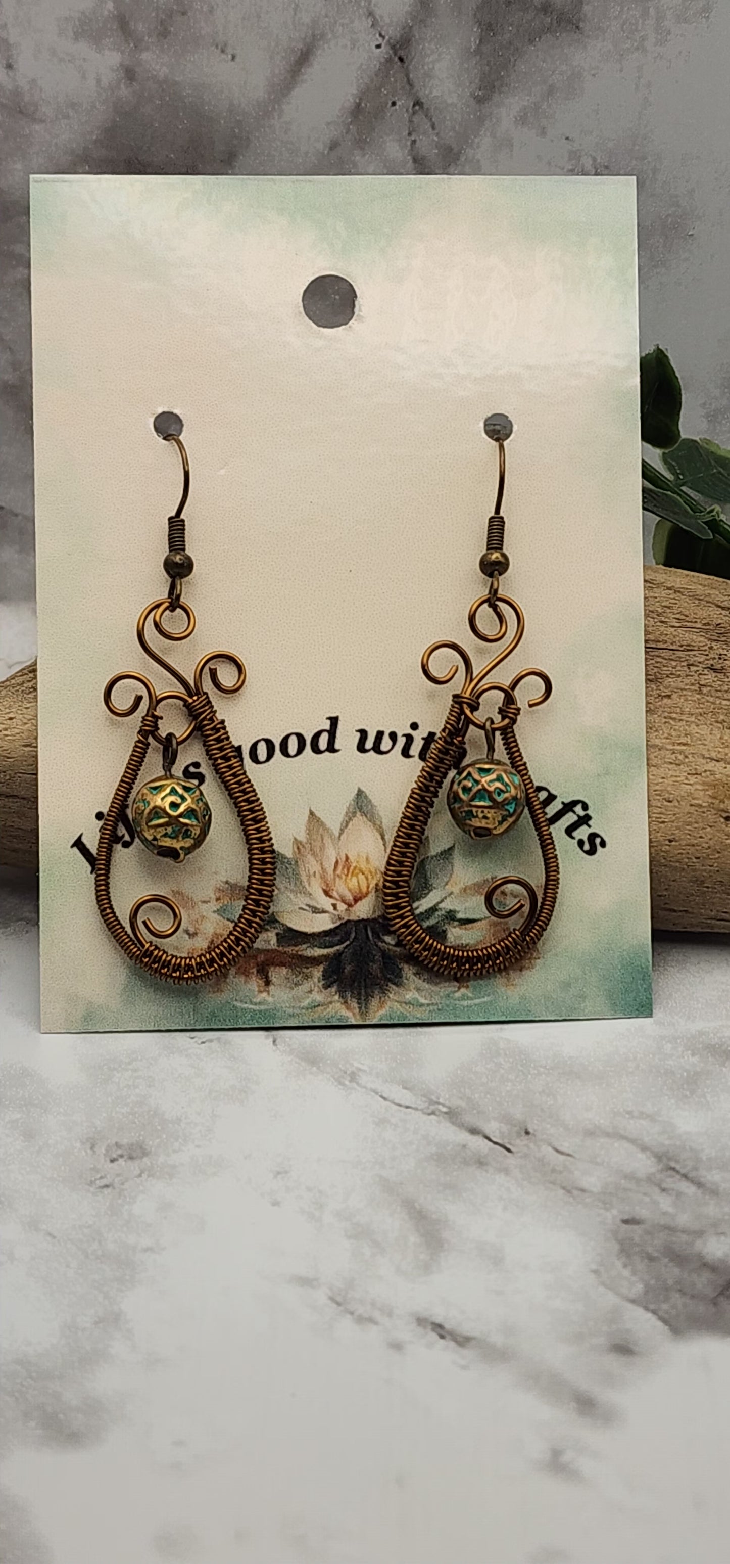 Wire Wrapped Teardrop Earrings with a Gold/Green Bead