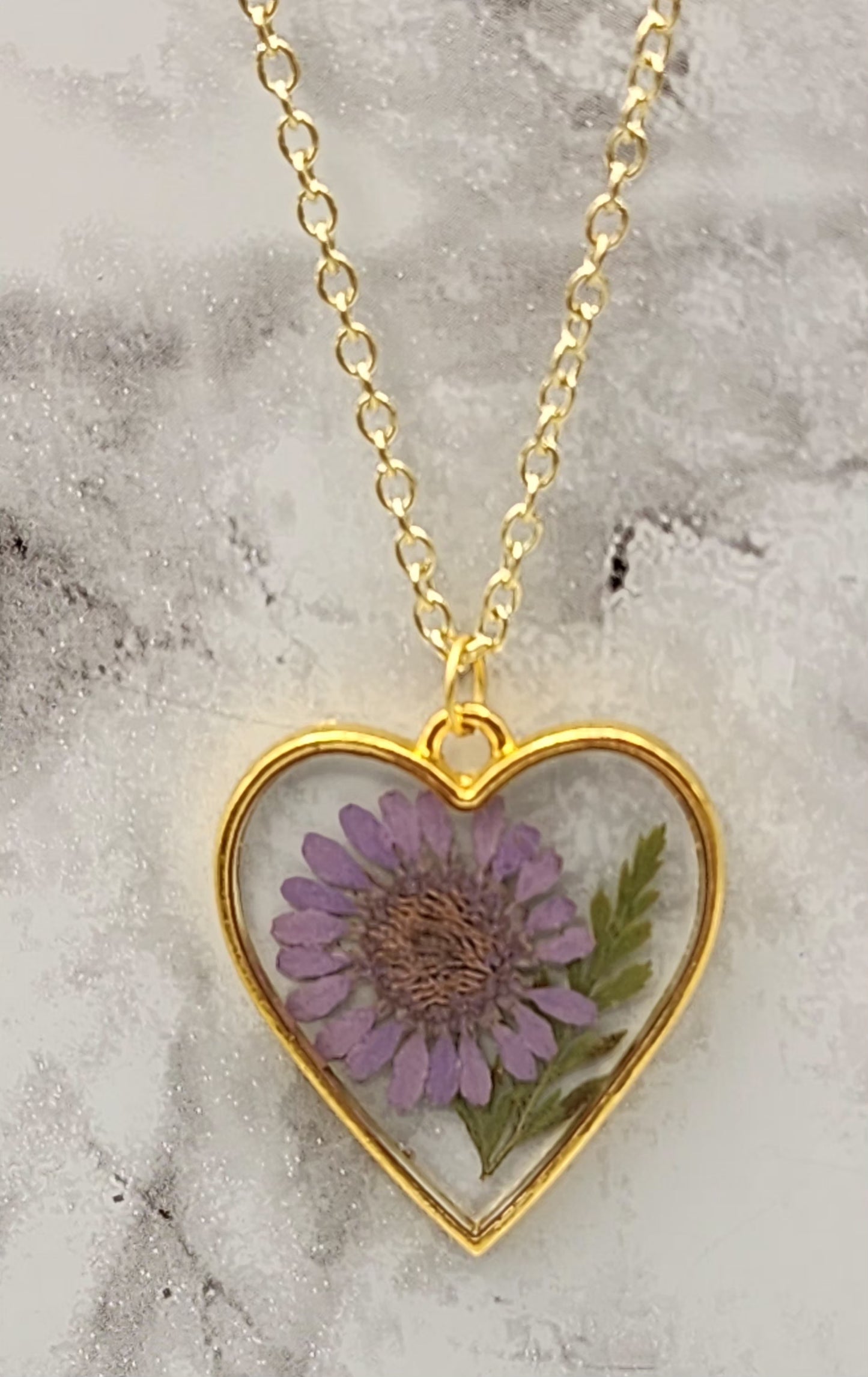 Dried Pressed Purple Daisy Resin Necklace in a Gold Plated Bezel