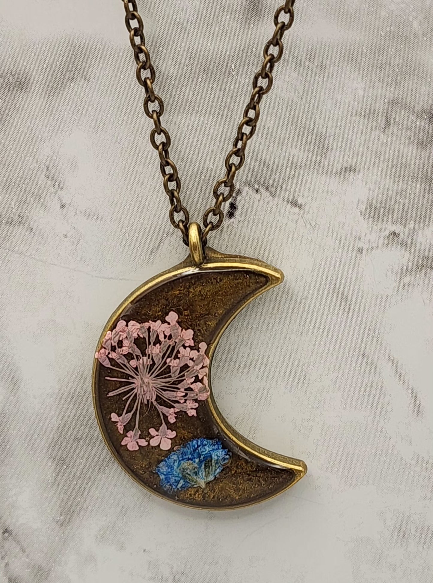 Dried Pressed Flower Resin in a Vintage Bronze Moon Shaped Bezel Necklace