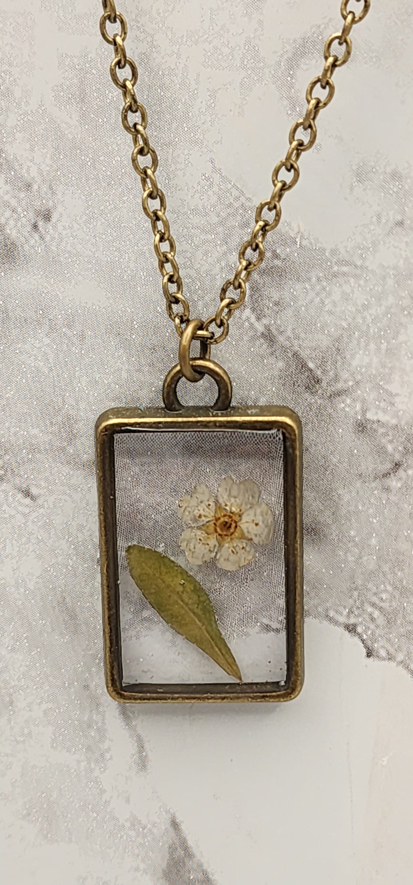 Dried Pressed Flower Resin Necklace in a Vintage Bronze Bezel